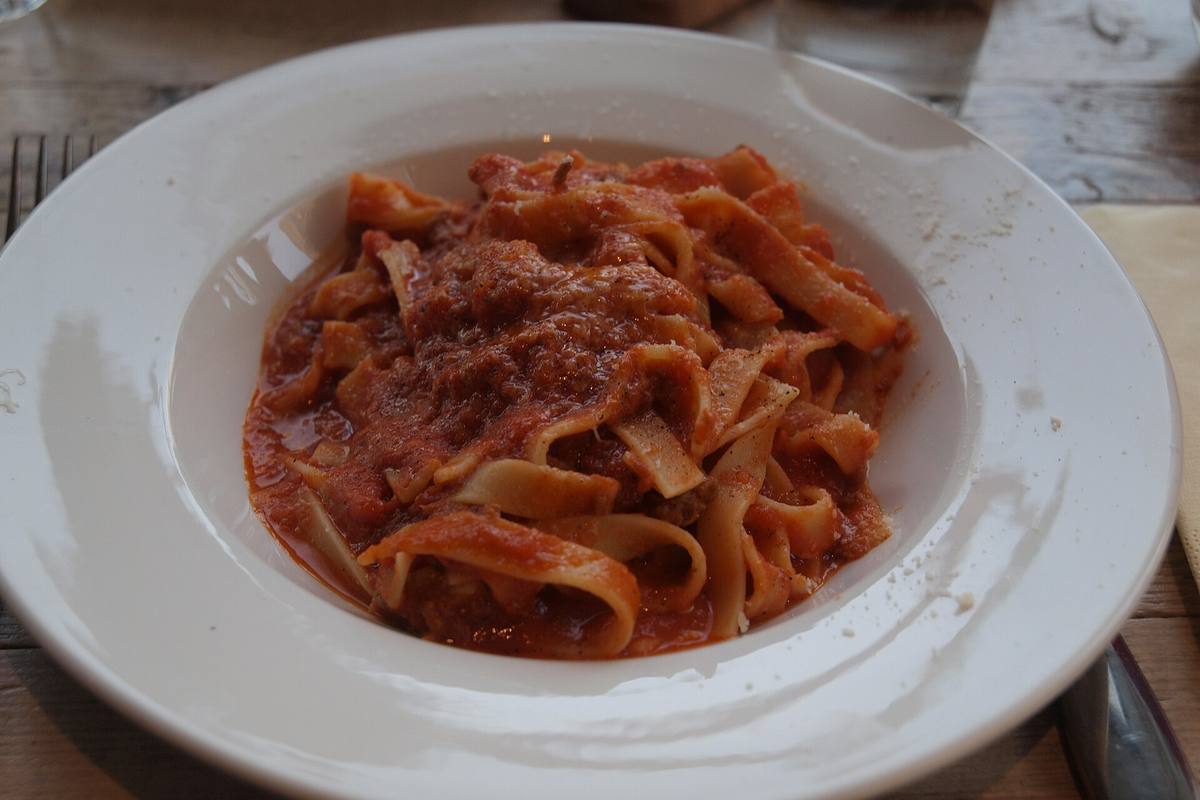 Bowl of fresh tagliatelle pasta at an Italian restaurant