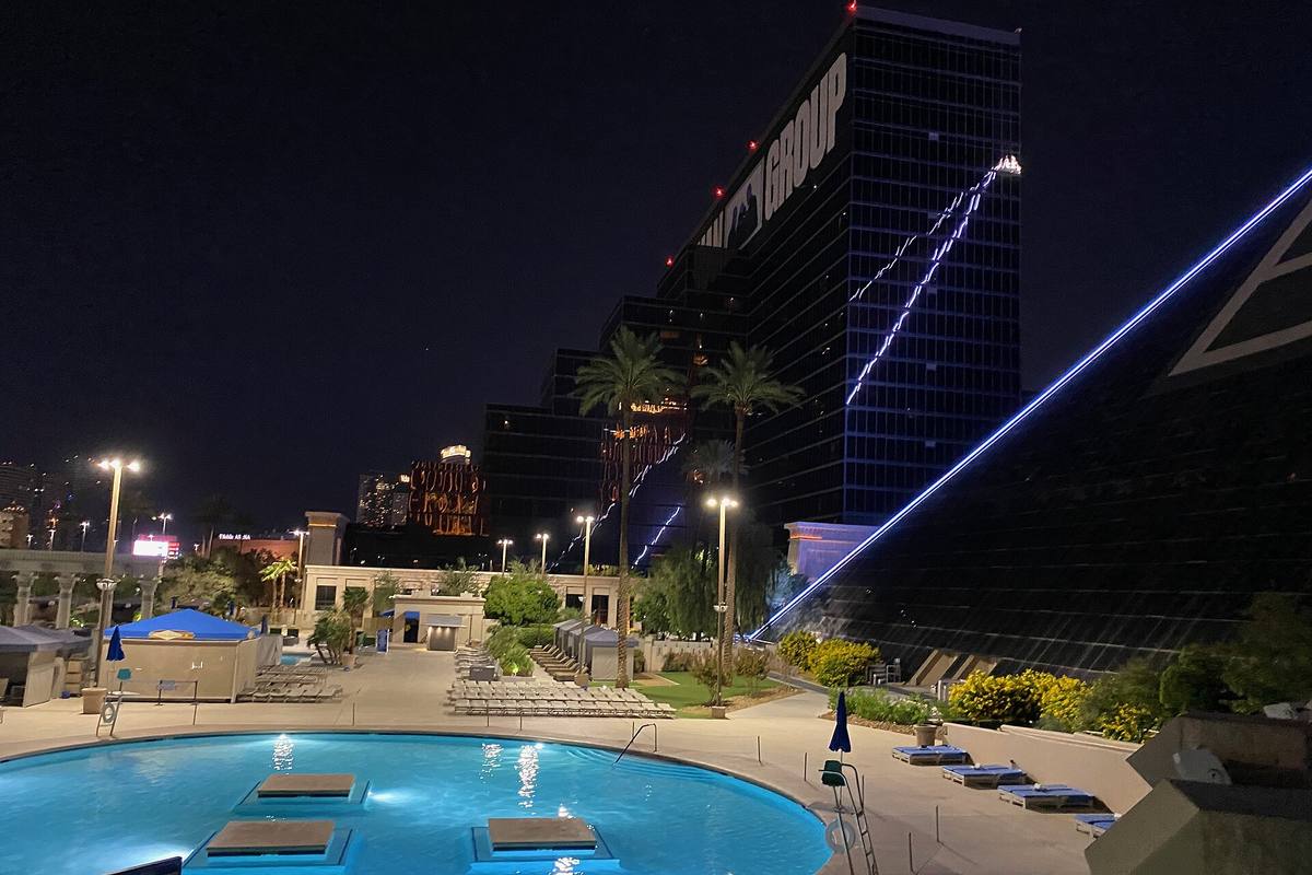 Palm-lined resort pool deck in Las Vegas